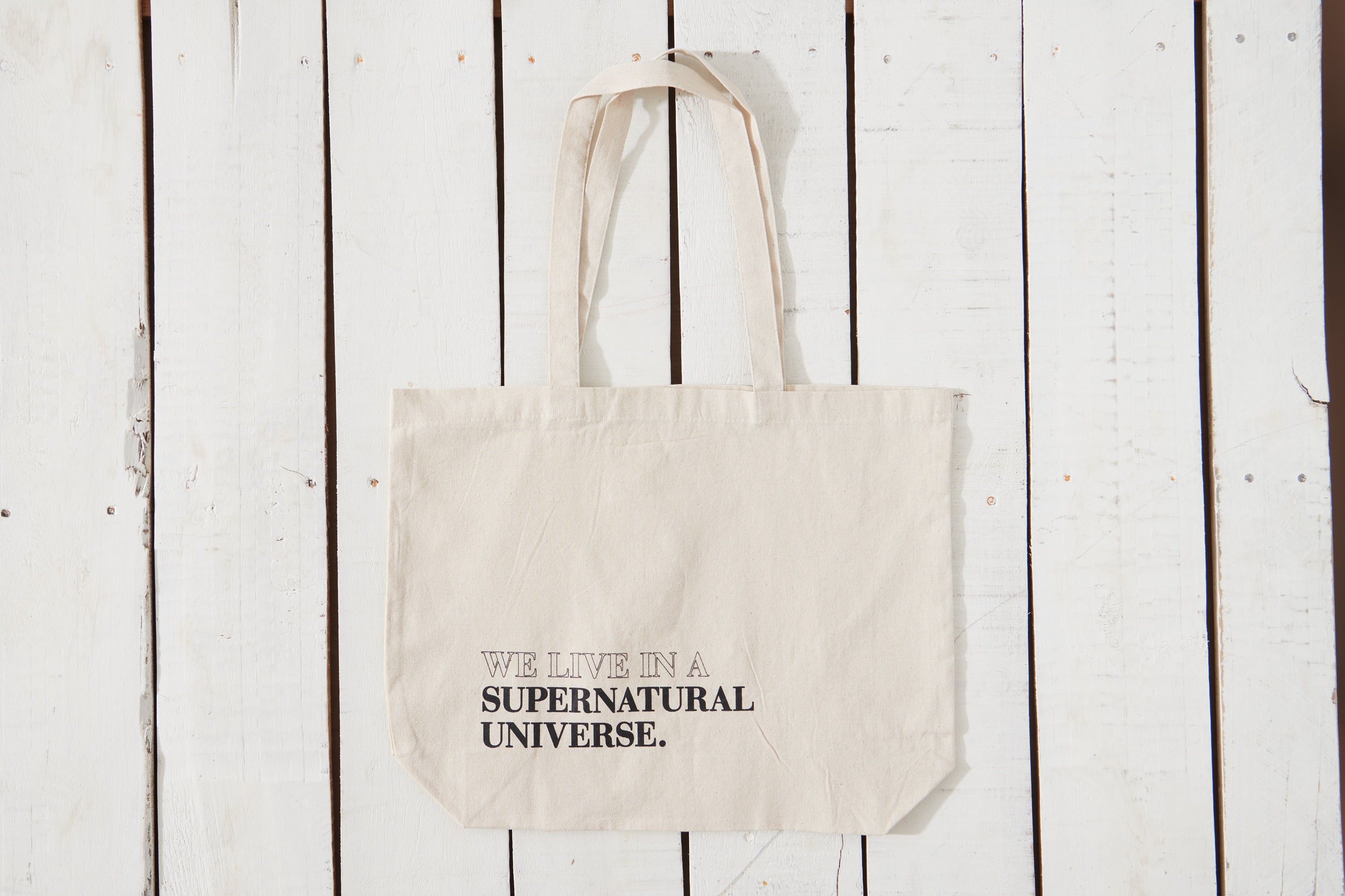 We Live In A Supernatural Universe Tote